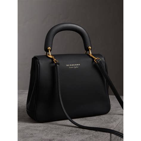 burberry top handle bag.